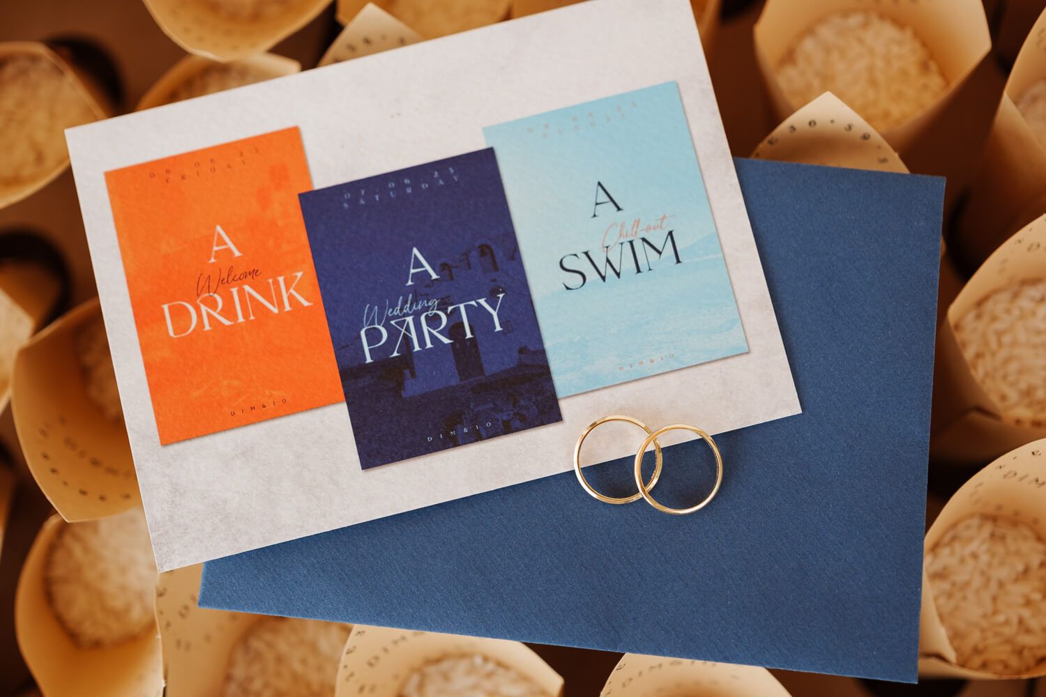 Close up of wedding rings and invitation in Paros Greece