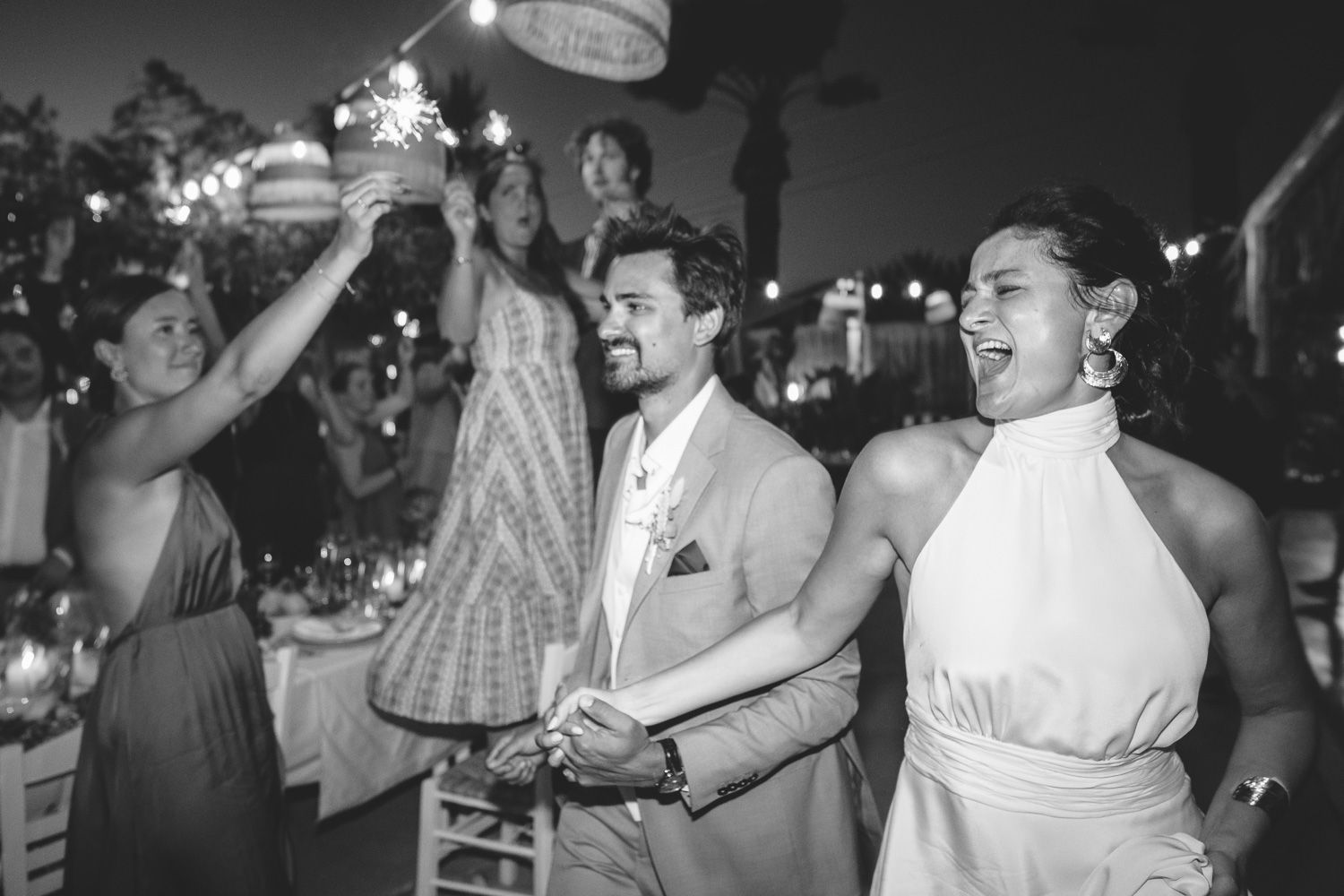 Couple entering at Seesoo Paros wedding reception
