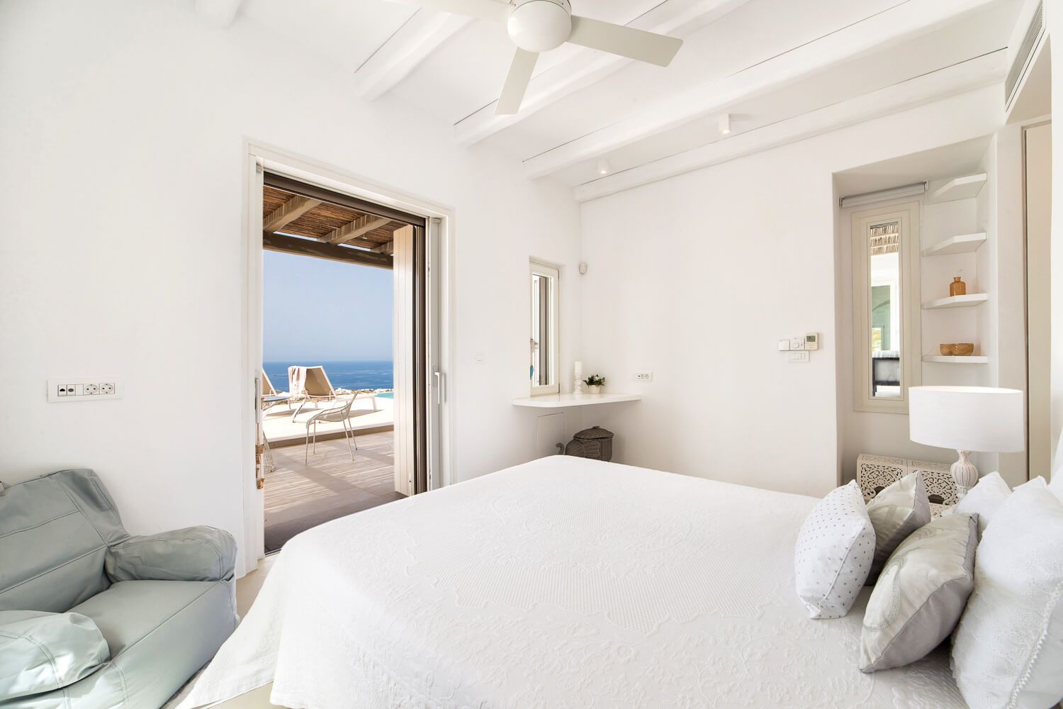 Luminous master bedroom offering a serene island retreat