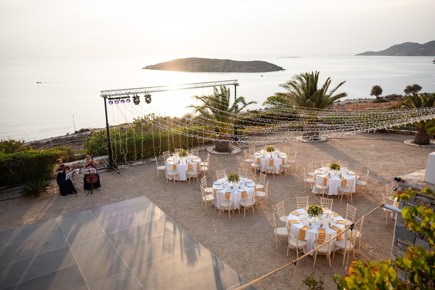 Stunning outdoor wedding reception setup at Villa Komito Syros