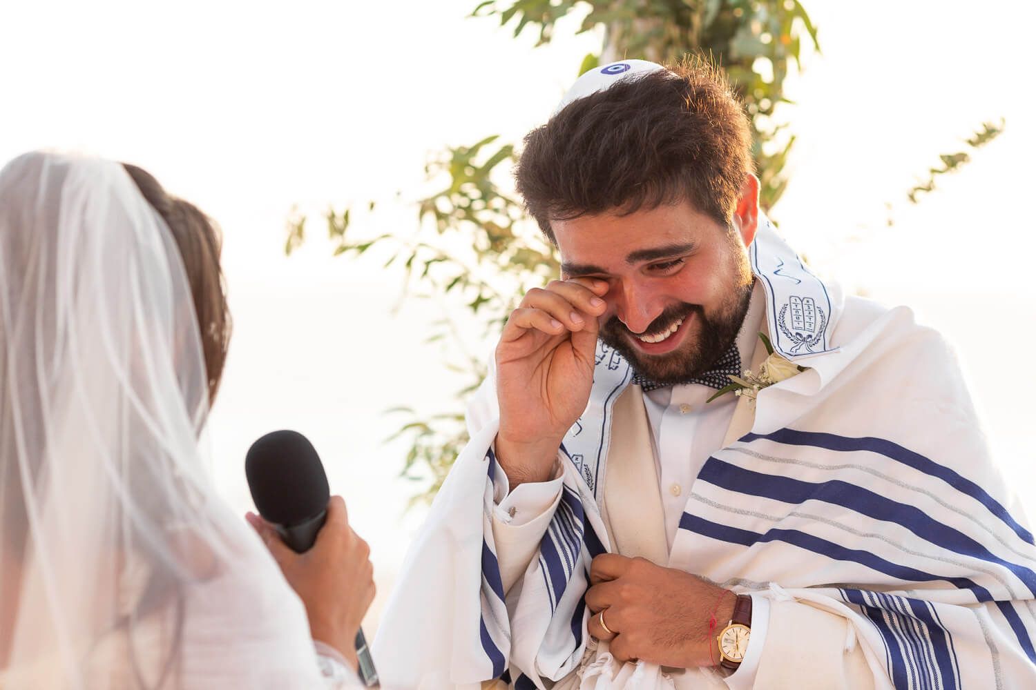 Exchange of rings during a traditional Jewish wedding in Paros