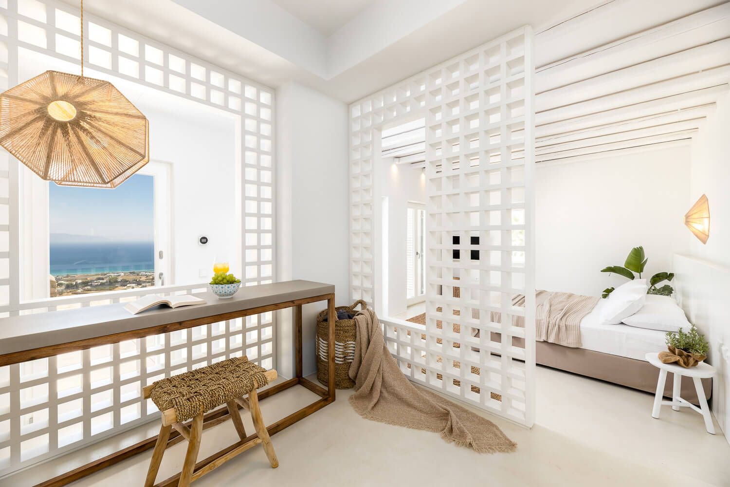 Curated bedroom decor enhancing the Cycladic living experience