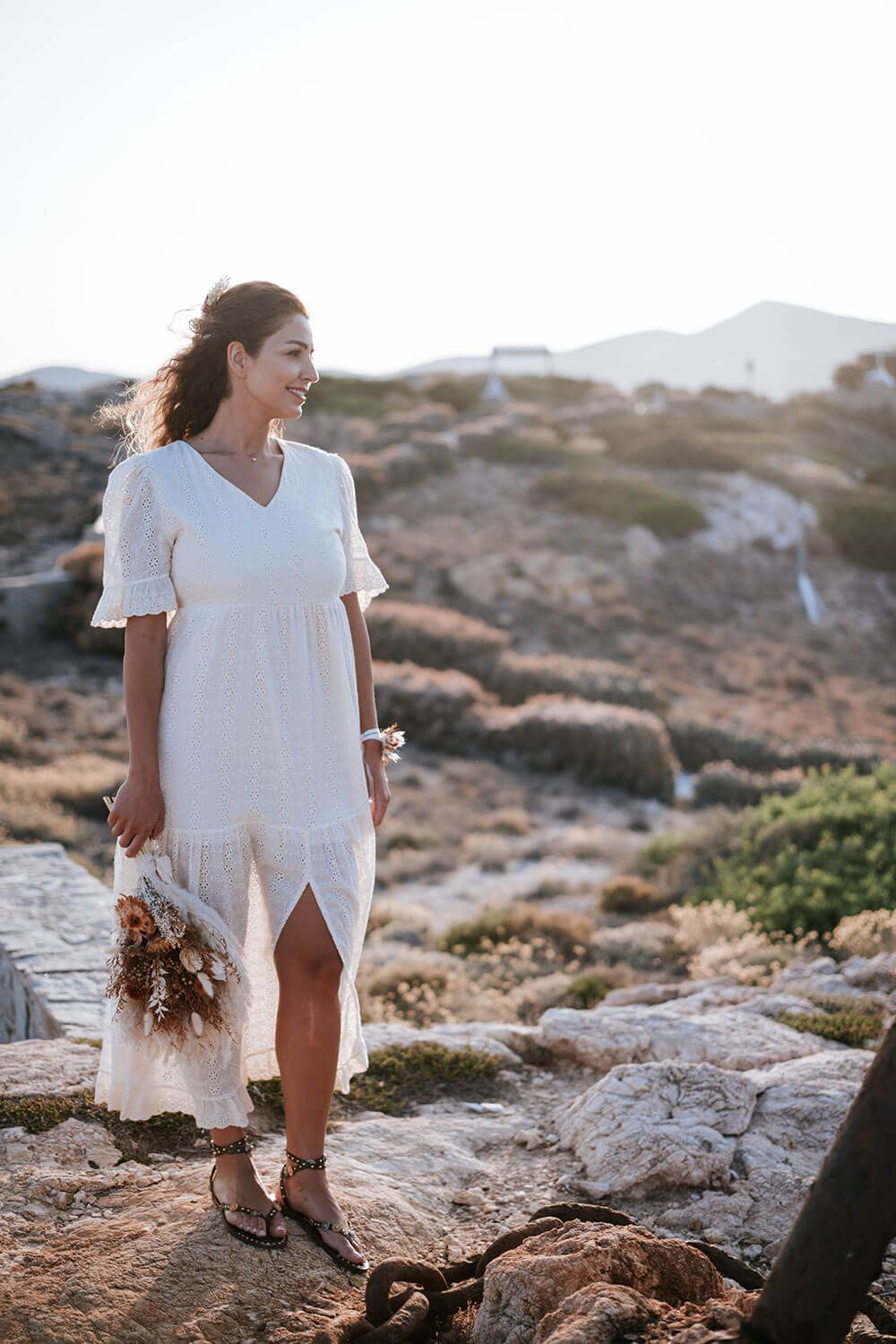 Bride-to-be Meli smiling beautifully during her pre-wedding shoot in Paros