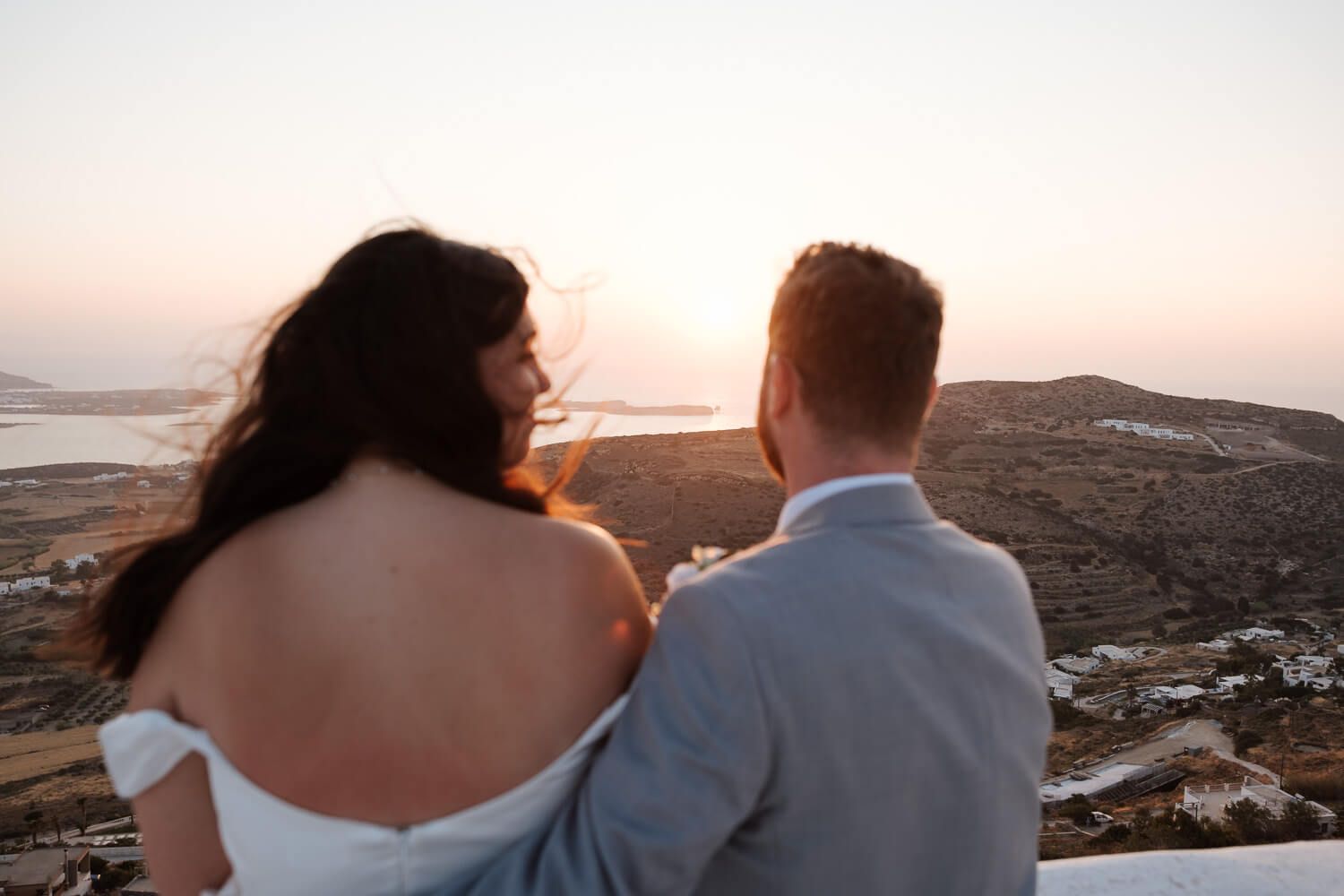 Couple silhouette against the Aegean sunset