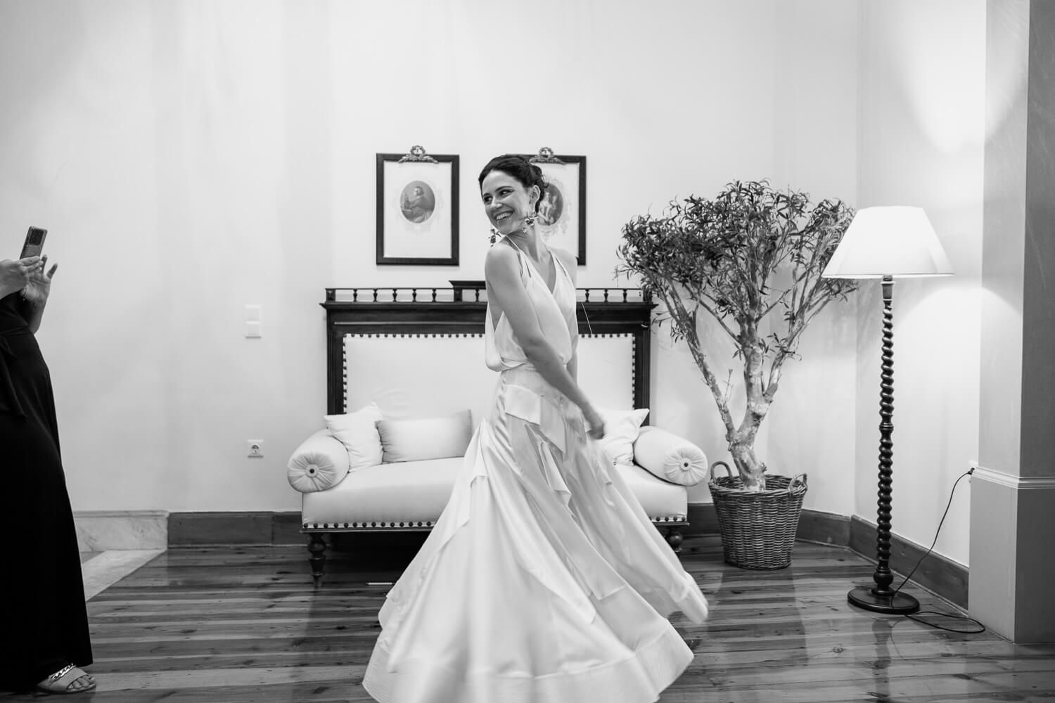 Bride posing for the guests before her wedding in Syros
