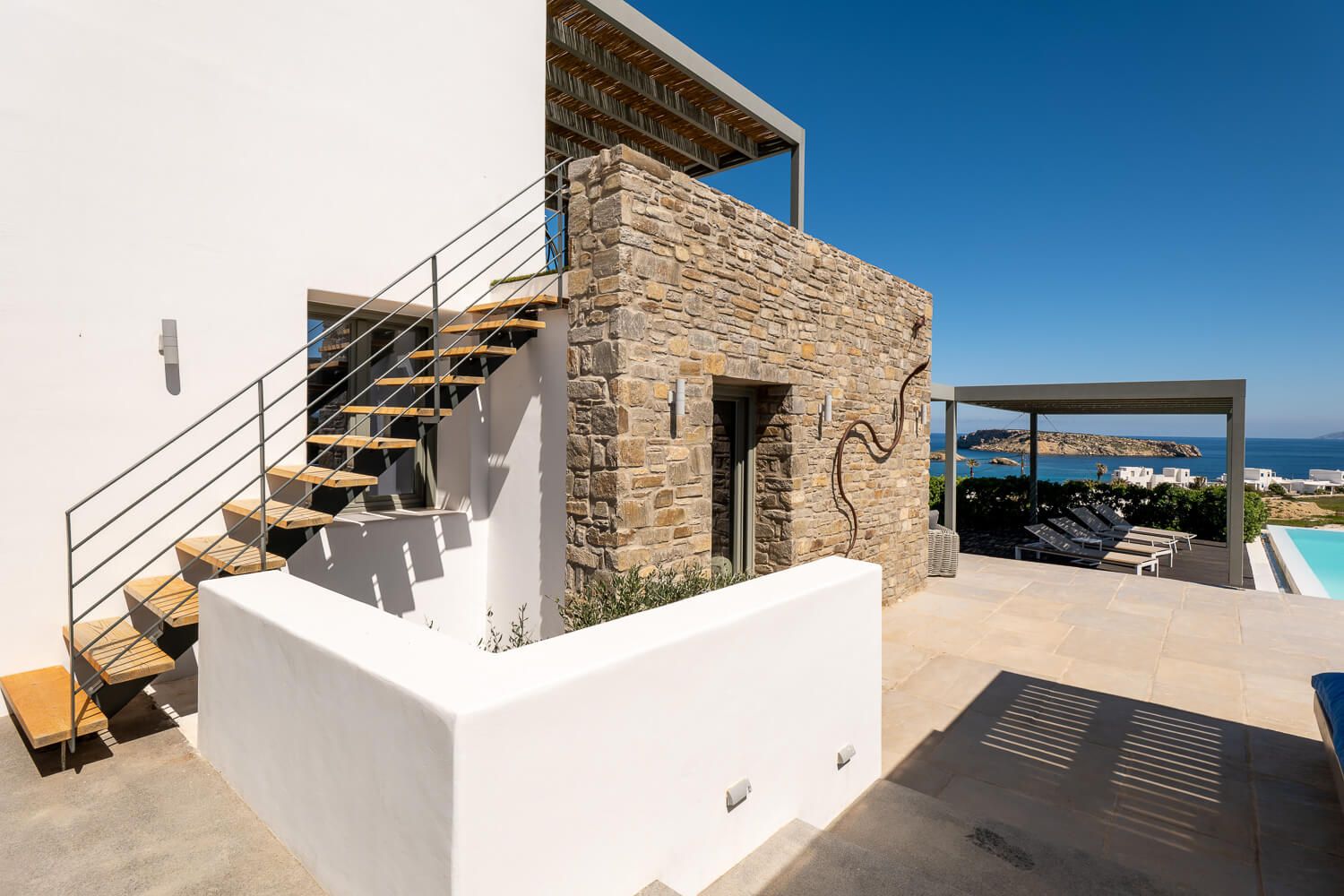 Contemporary chic exteriors near Mikri Santa Maria beach