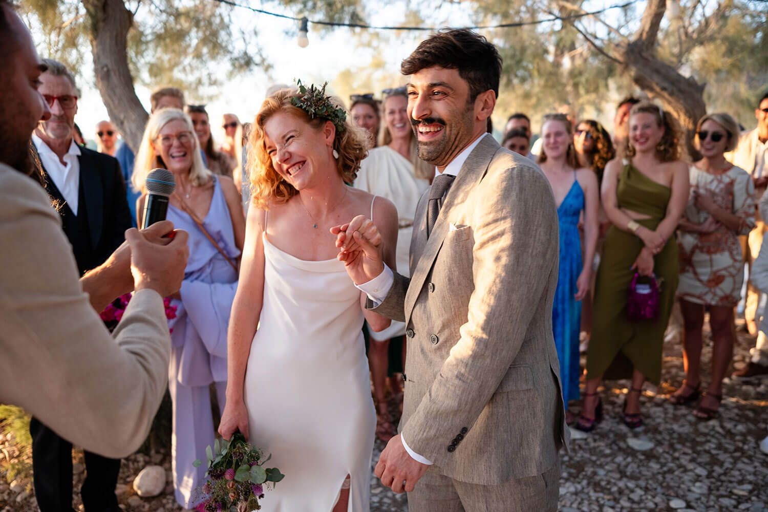 Touching wedding ceremony right on the beach at Thalassa Mou restaurant