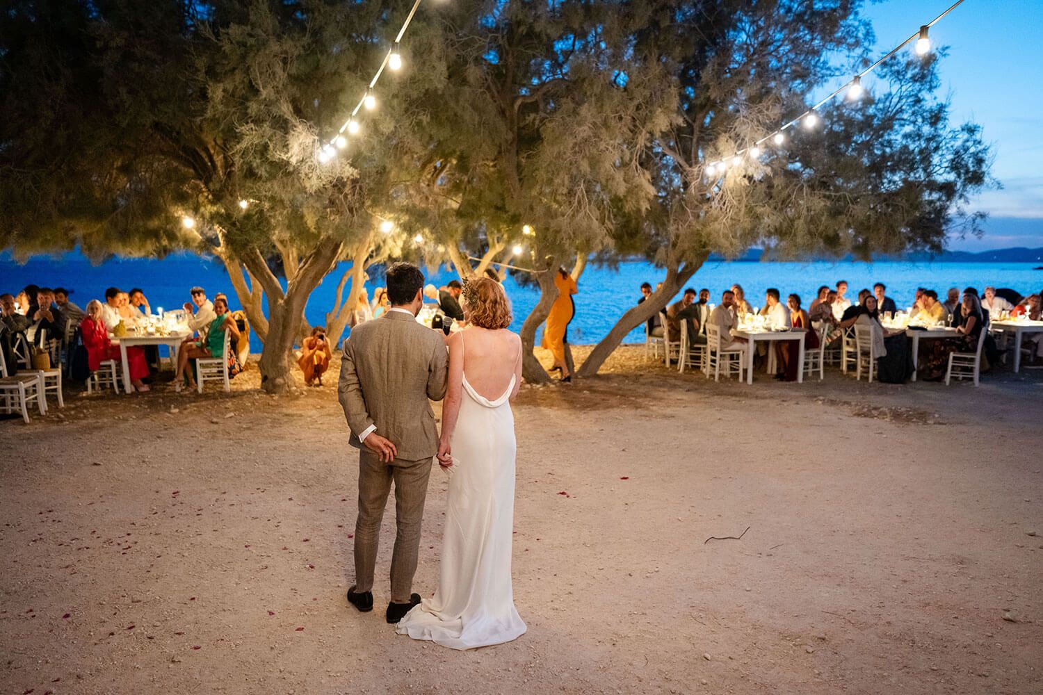 Emotional wedding speeches at a restaurant wedding reception in Greece
