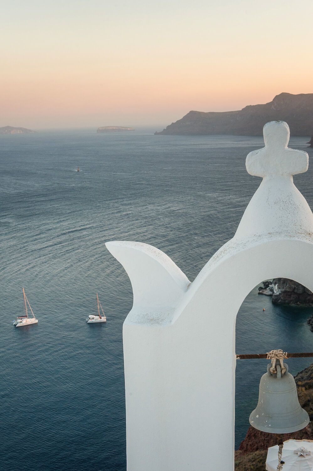 The harmonious blend of sunset colors and traditional island design in Santorini