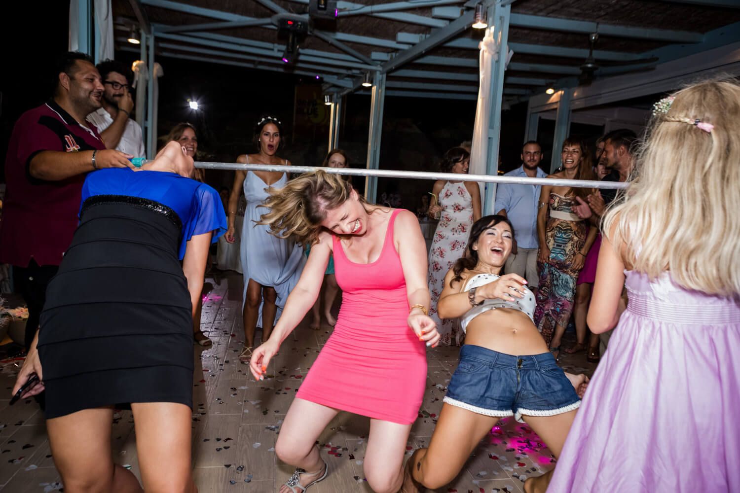 Guests dancing and celebrating at Deep Blue Beach Bar