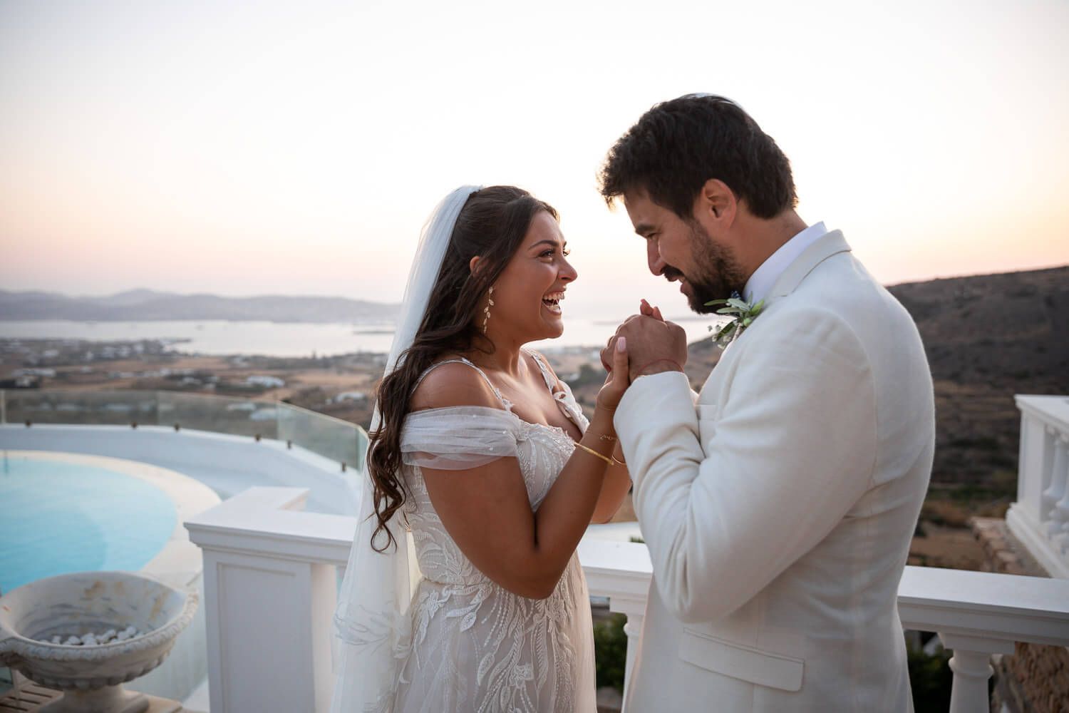 Newlyweds posing after their Jewish wedding ceremony in Greece