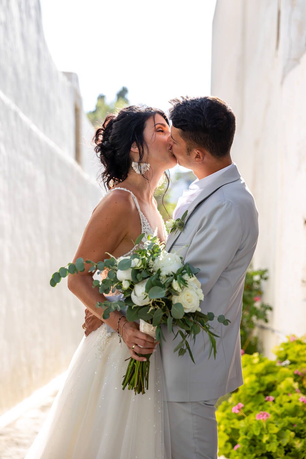 Intimate moment between the Italian couple during their Paros destination wedding