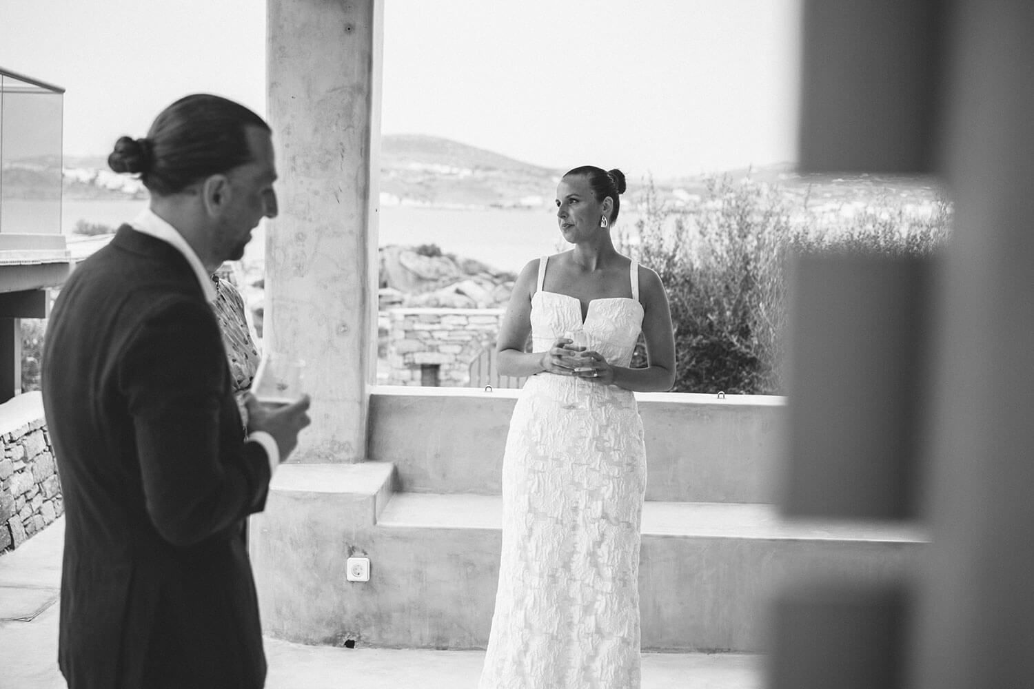Intimate moment between bride and groom at a Cyclades destination wedding