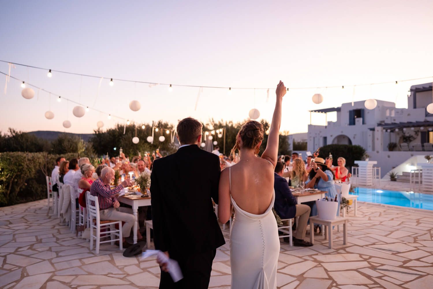 Jess and Daniel sharing their romantic first dance in the villa courtyard