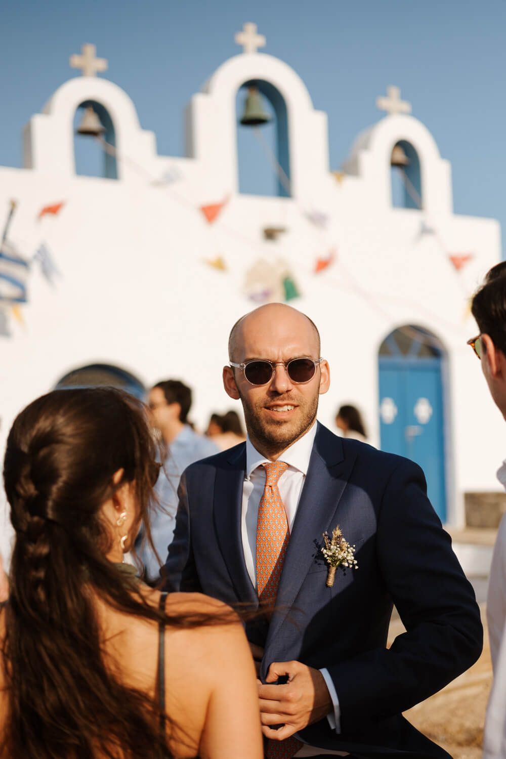 Groom Dimitris outside of Pyrgaki chapel