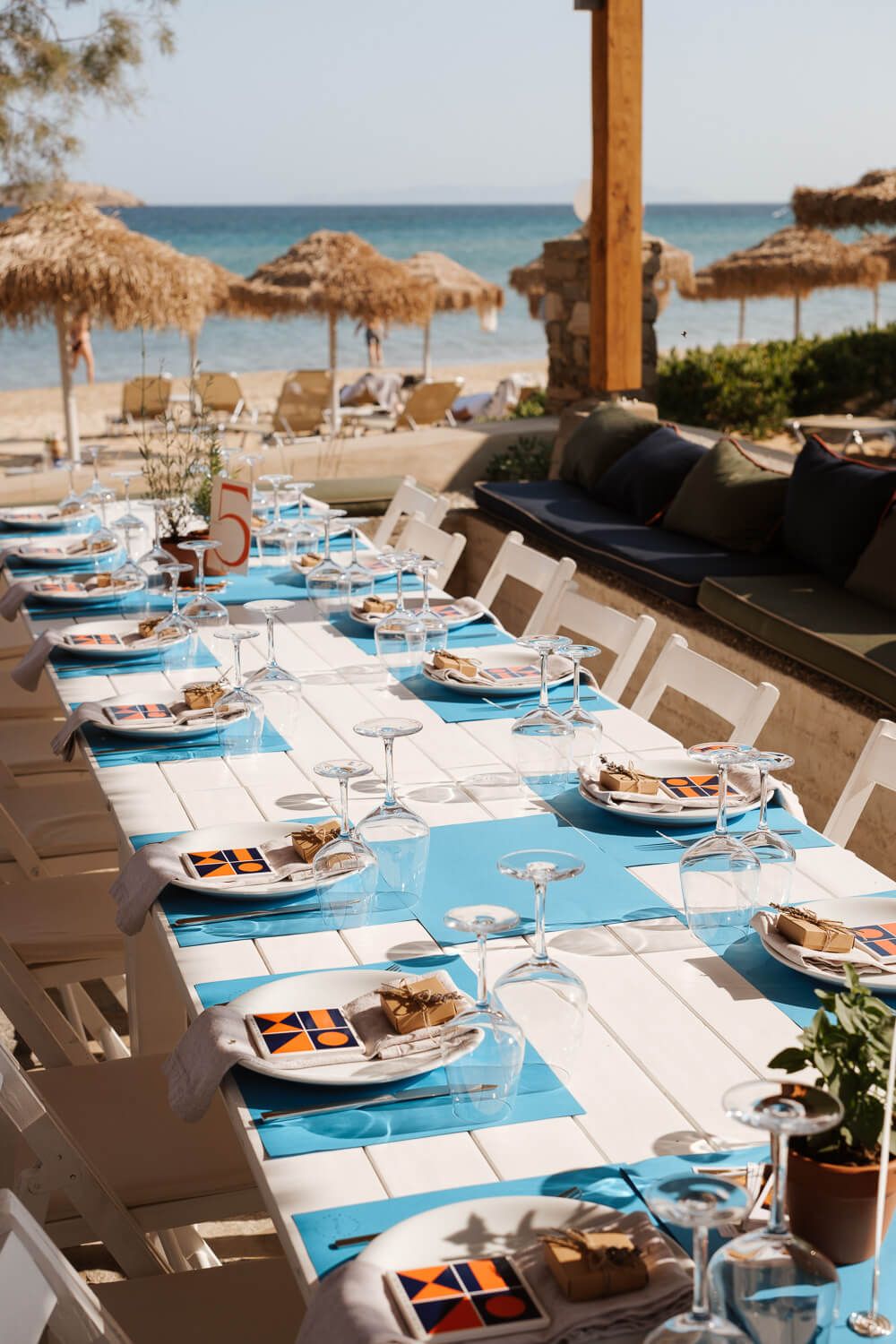 Shot of beautiful wedding reception decor and table settings overlooking the sea at Rebel Bar Paros