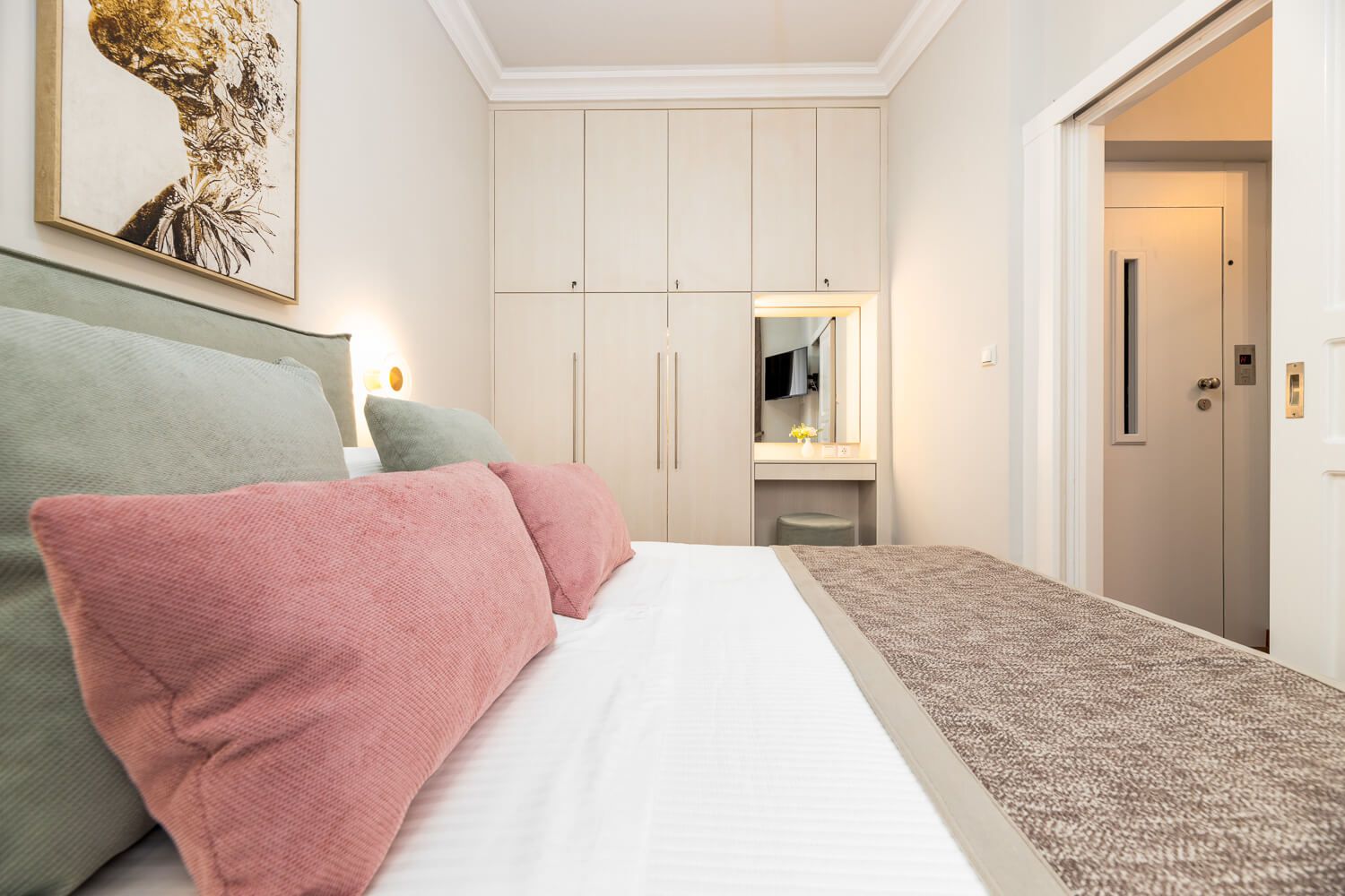 Comfortable bed with premium linens at Asty Apartments