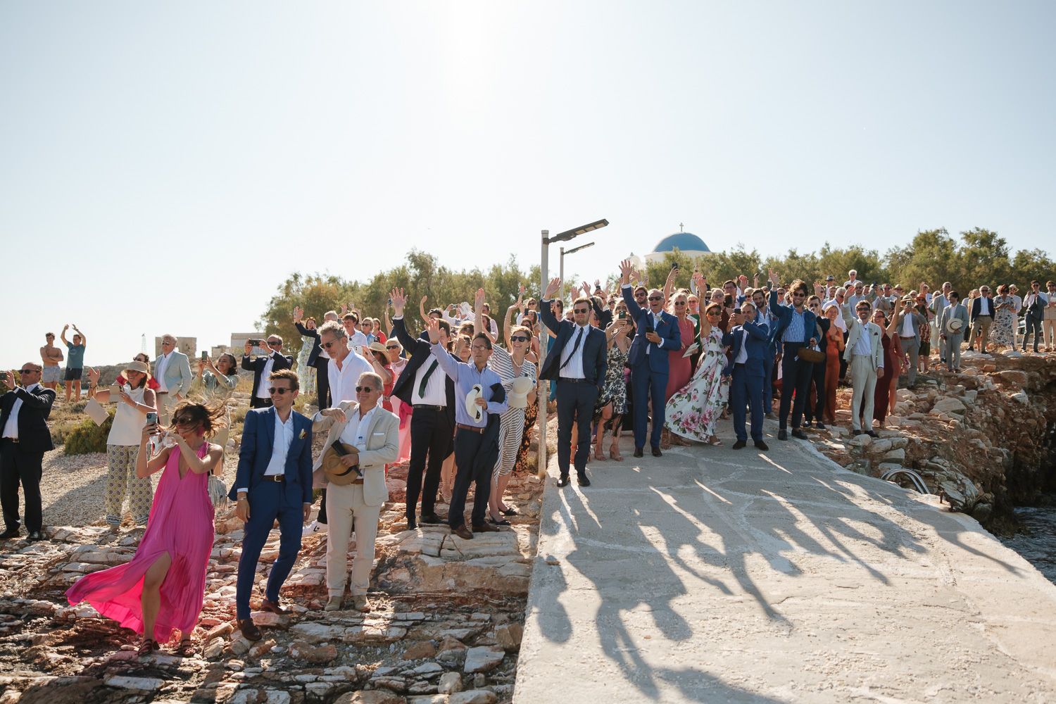 Guests waiting at the pier for the bride - Paros wedding