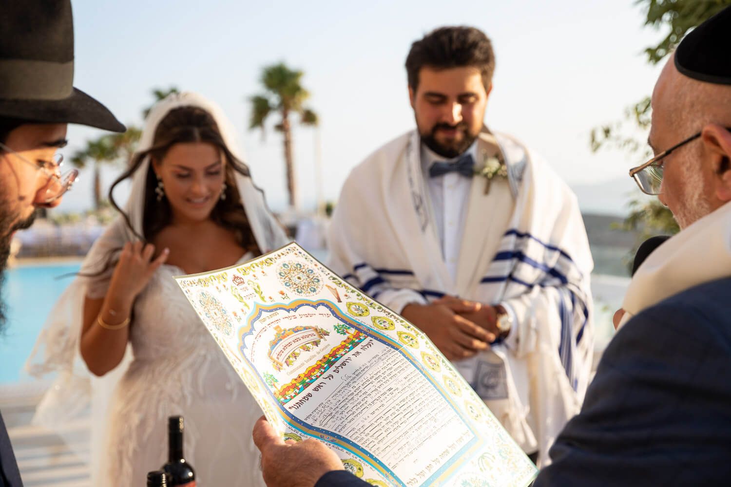 Exchange of rings during a traditional Jewish wedding in Paros