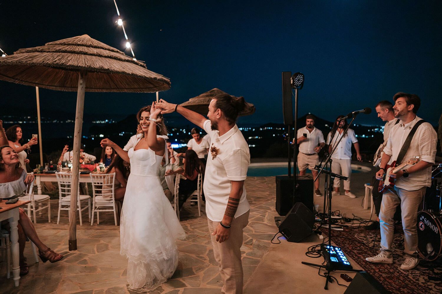 The couple sharing a romantic but fun first dance under the stars