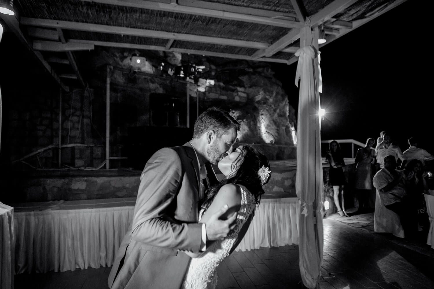 First dance of the newlyweds at a beach bar in Milos