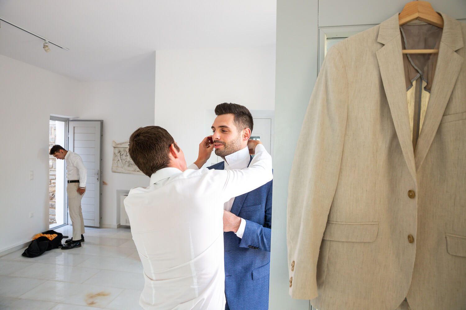 Candid moments of the groom before the Jewish ceremony in Paros