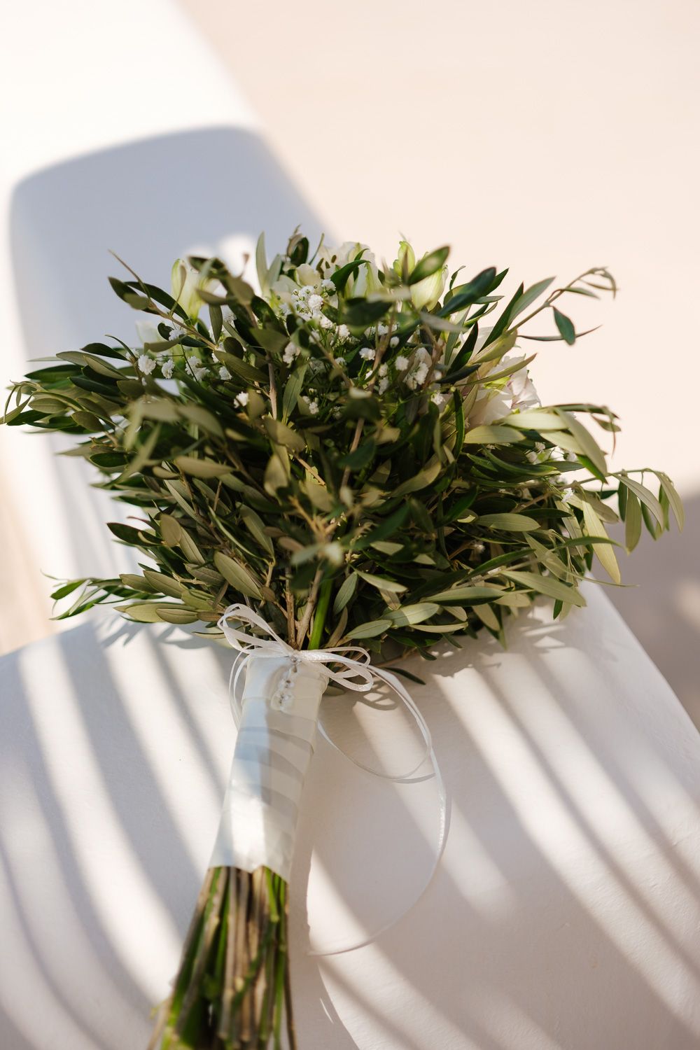 Minimal wedding details and dress in natural light