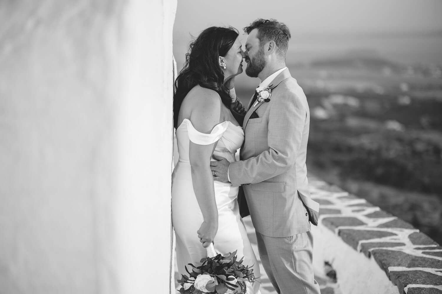 Relaxed couple portraits with Antiparos in the background