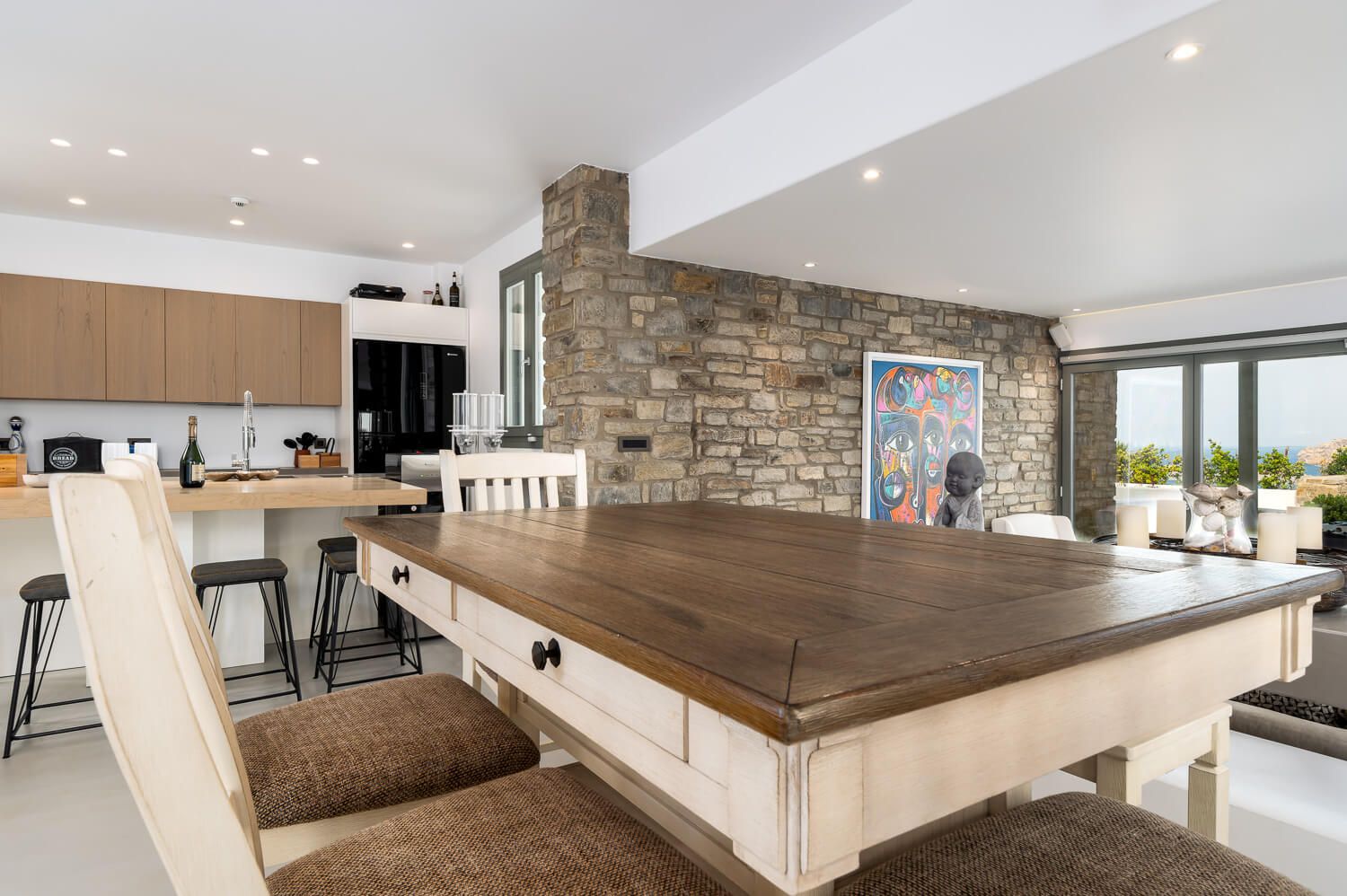 Natural light filling the luxurious dining area at Villa Half Moon