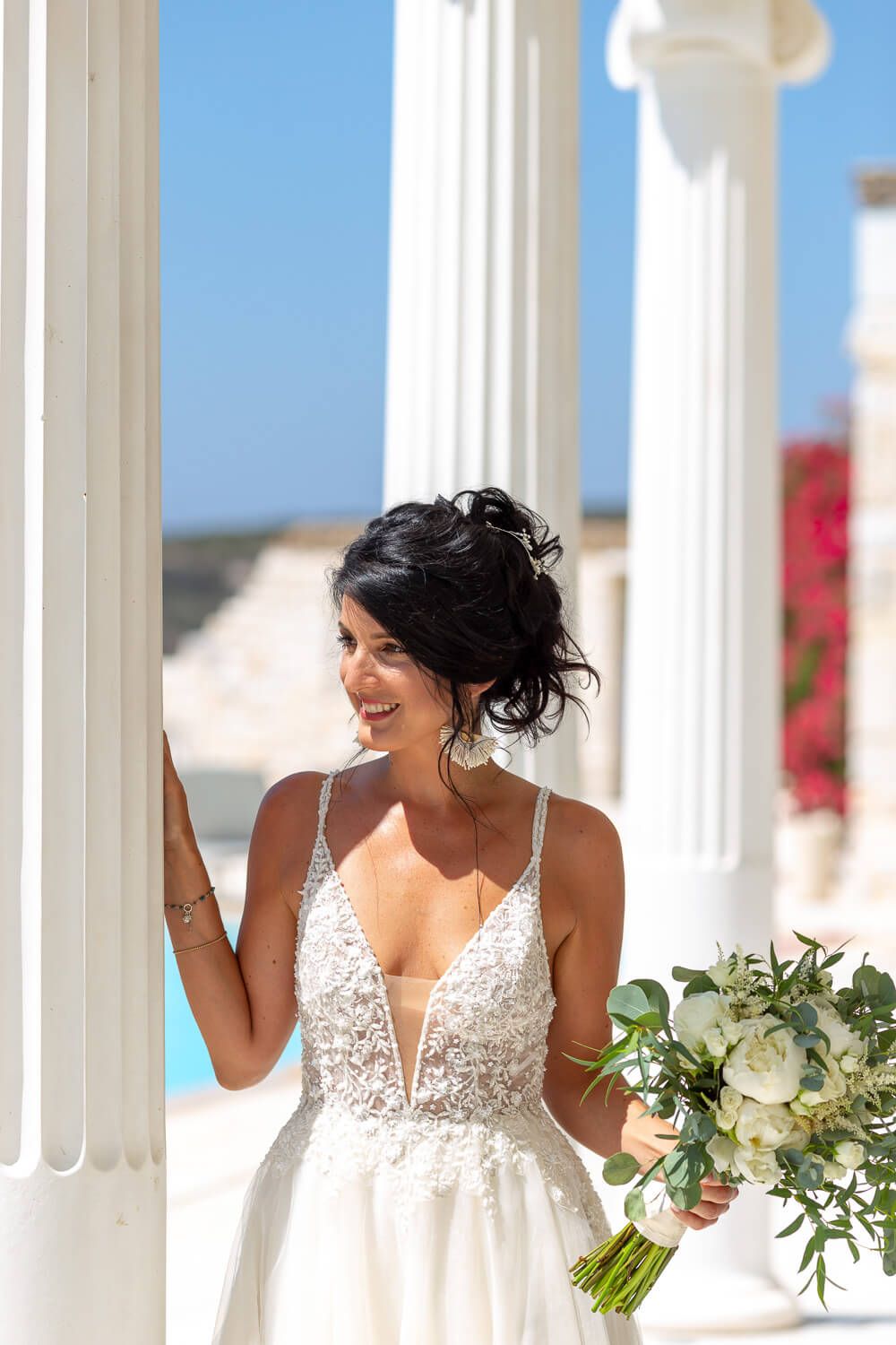 Bride Erika posing before her Catholic Italian wedding in Paros at Villa Aethra