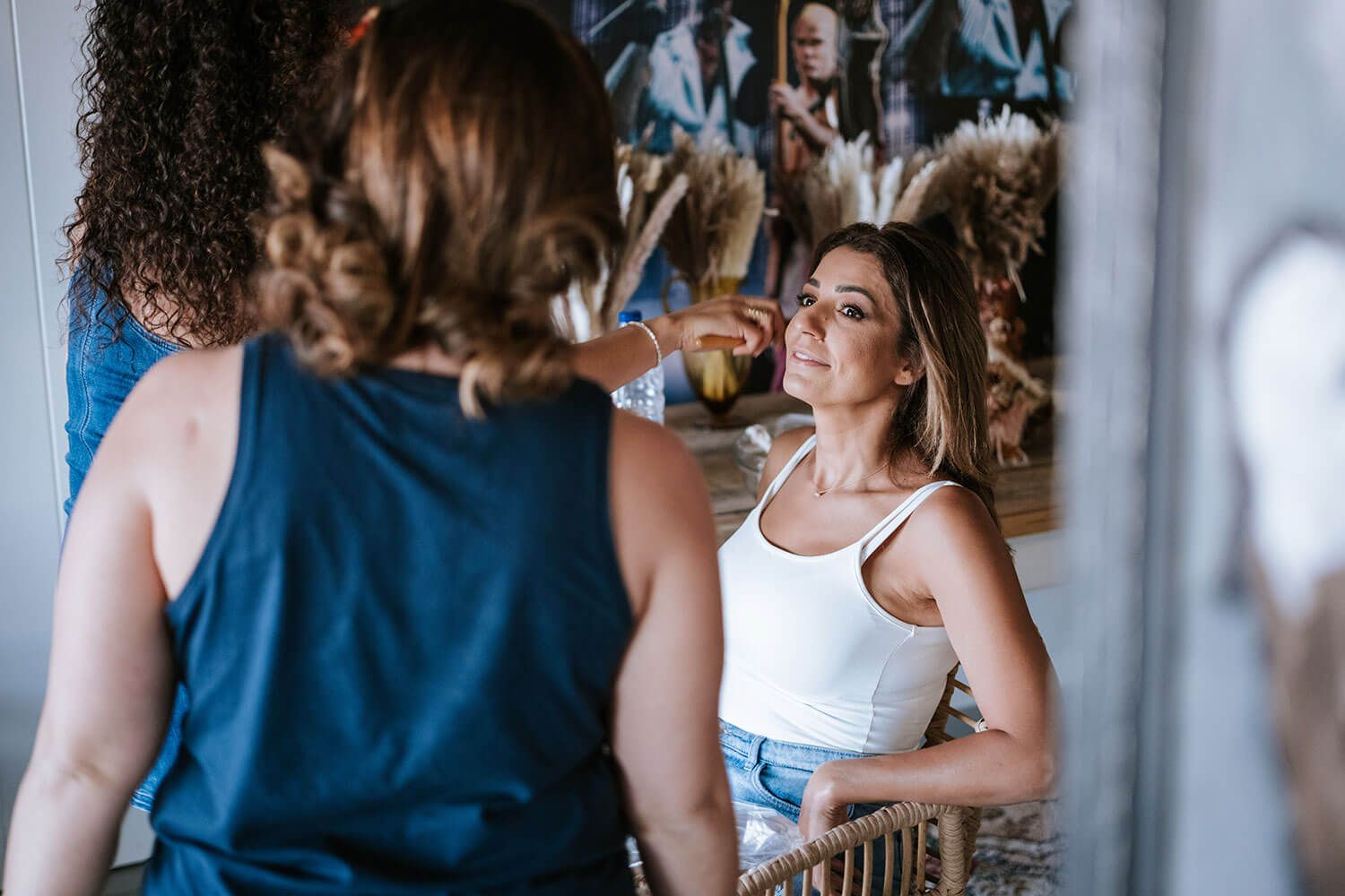 Bride getting ready with her bridesmaids in Isterni Paros
