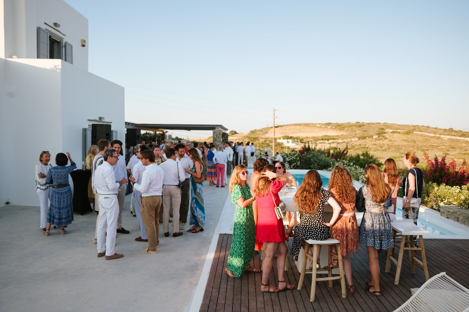 Candid moments during wedding rehearsal dinner in Greece
