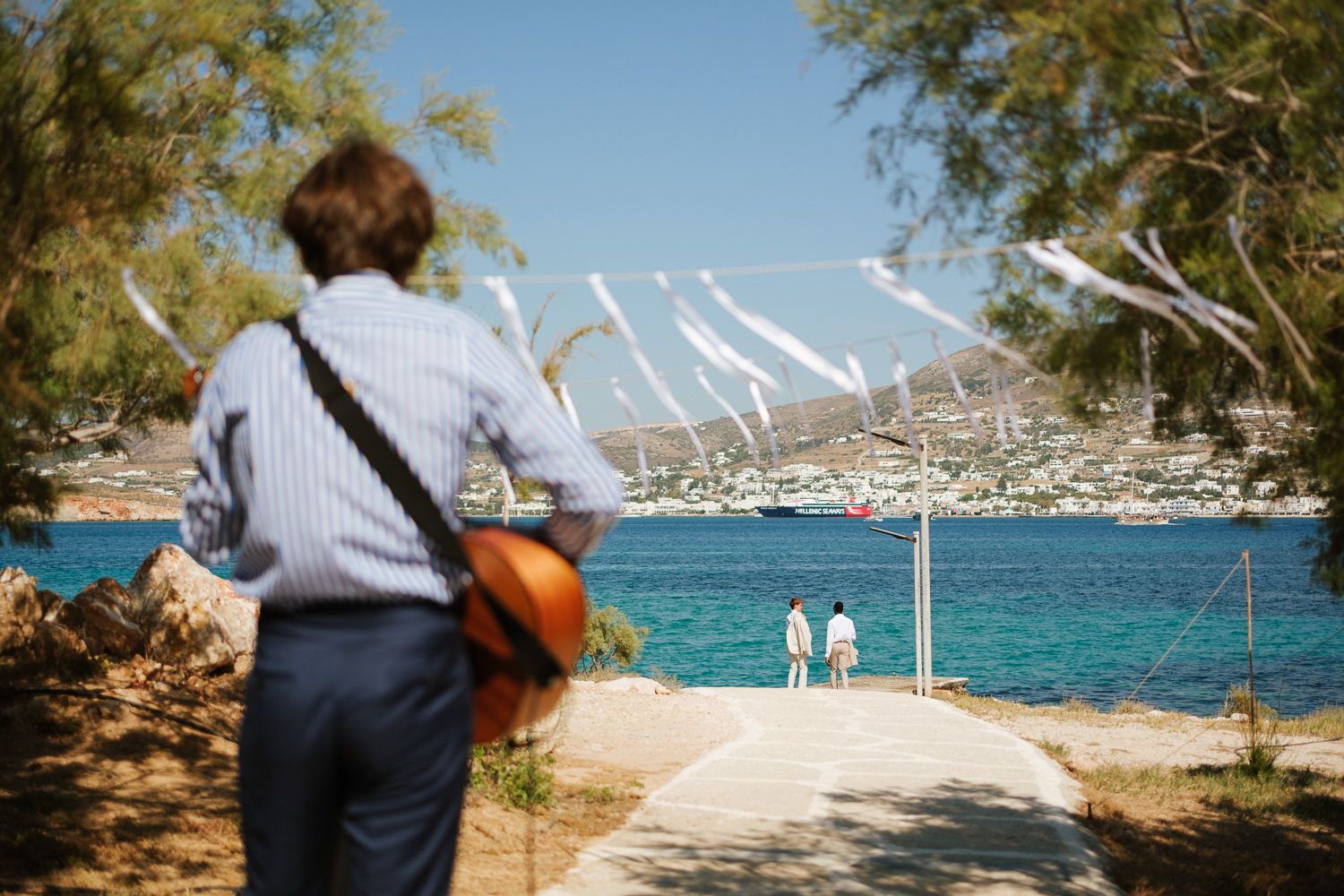 Guests waiting at the pier for the bride - Paros wedding
