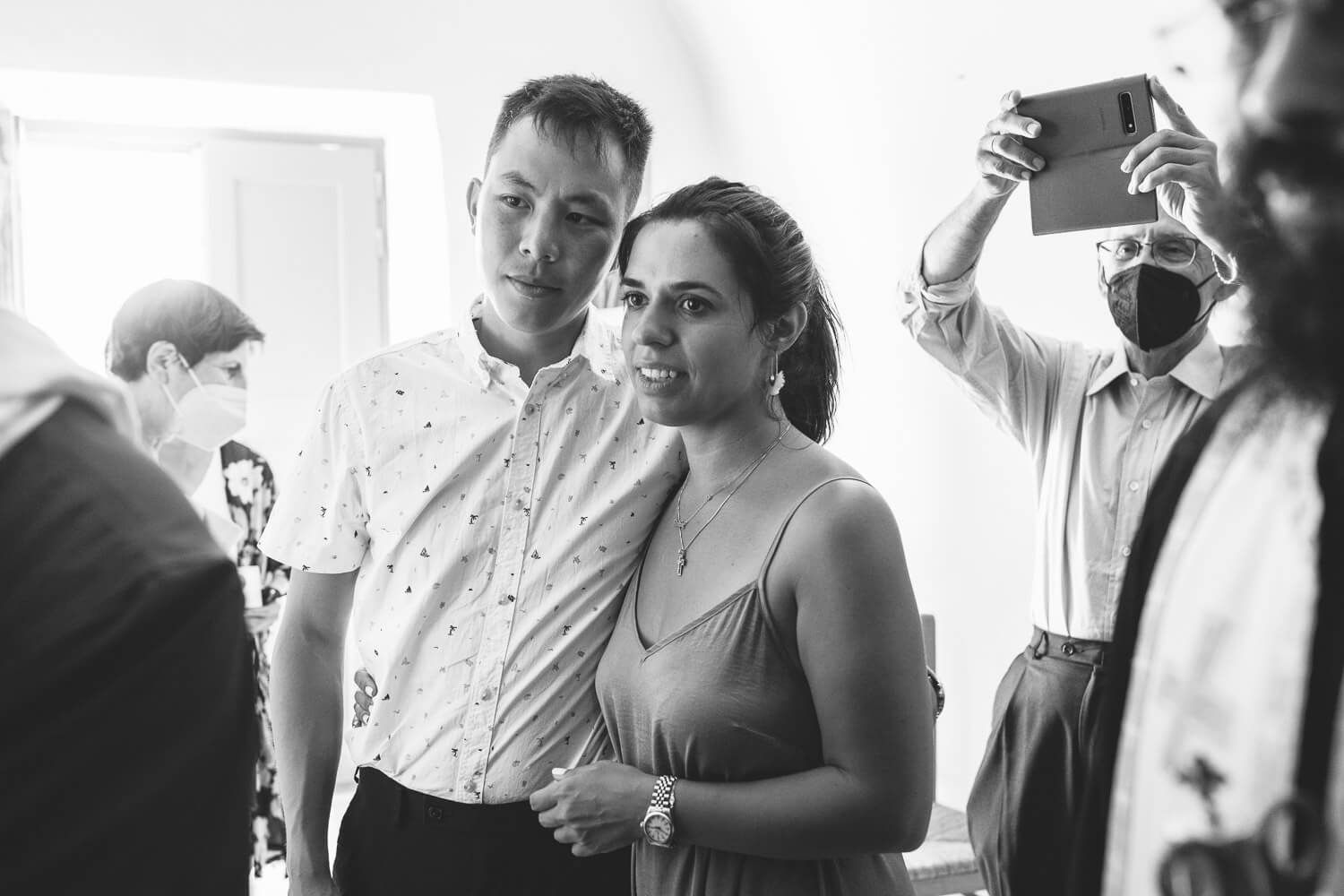 Godparent and baby moment during the sacrament