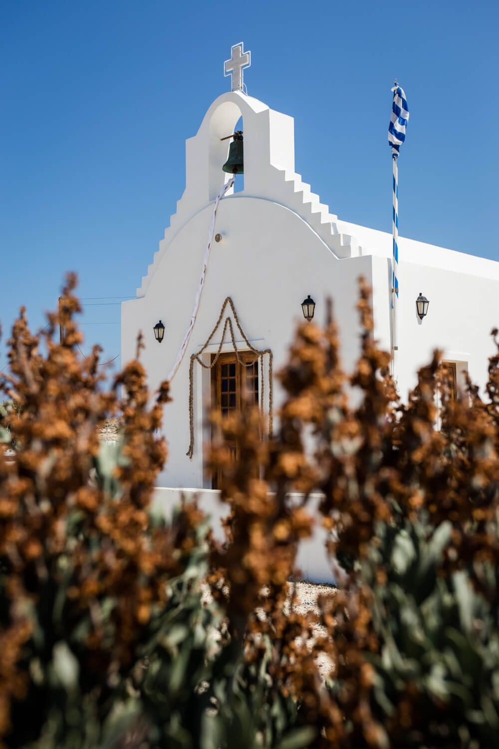 Wedding ceremony at Agios Konstantinos church by the sea in Milos