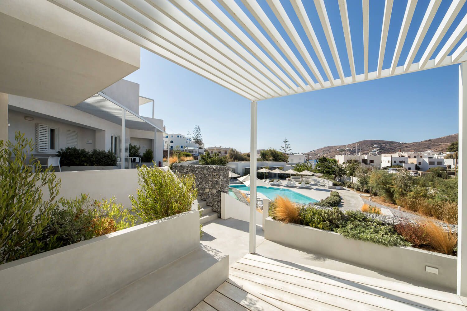 The modern exterior design of Relux Ios Hotel at the marina