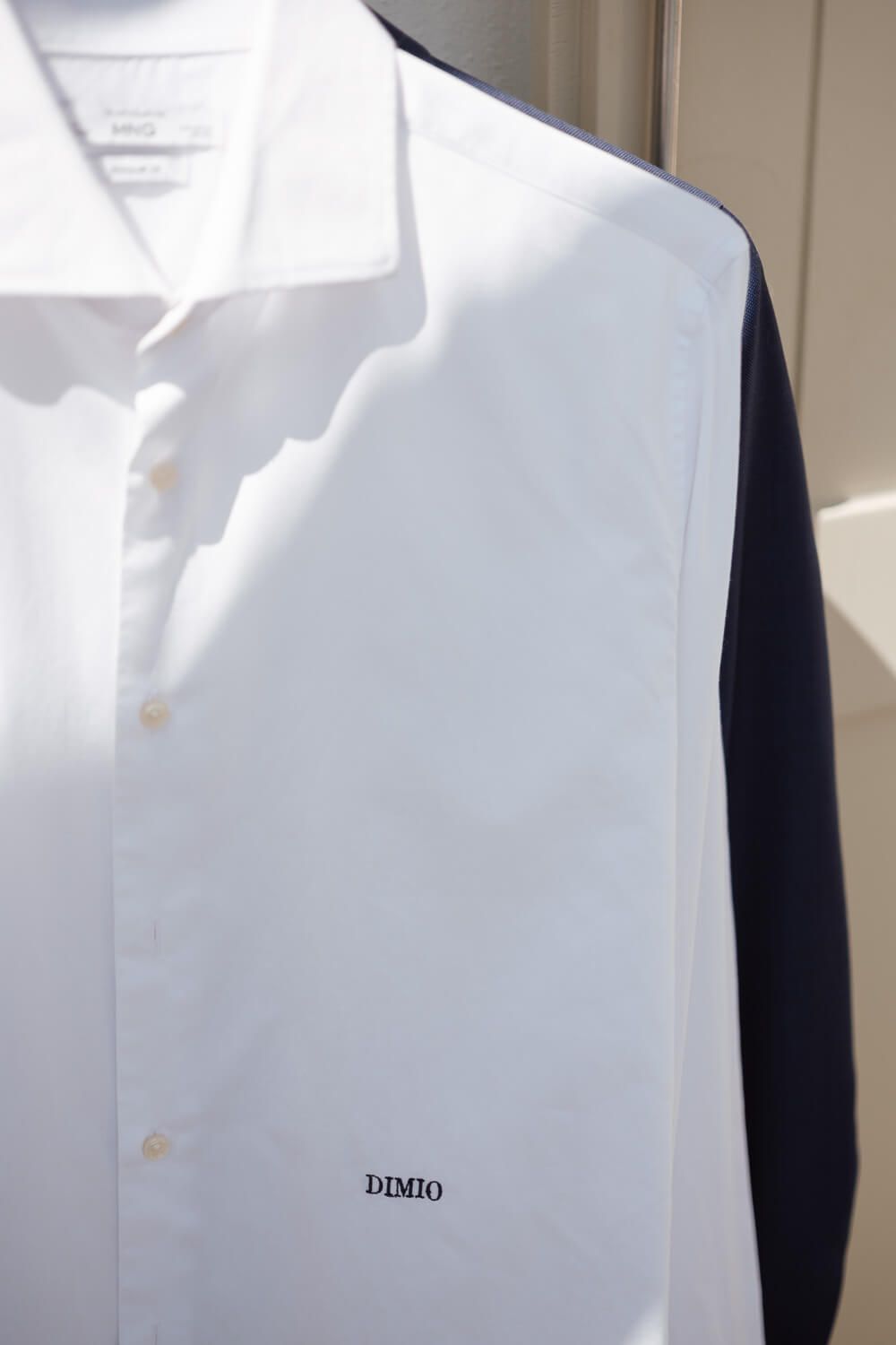 Close up of groom's shirt in Chryssi Akti