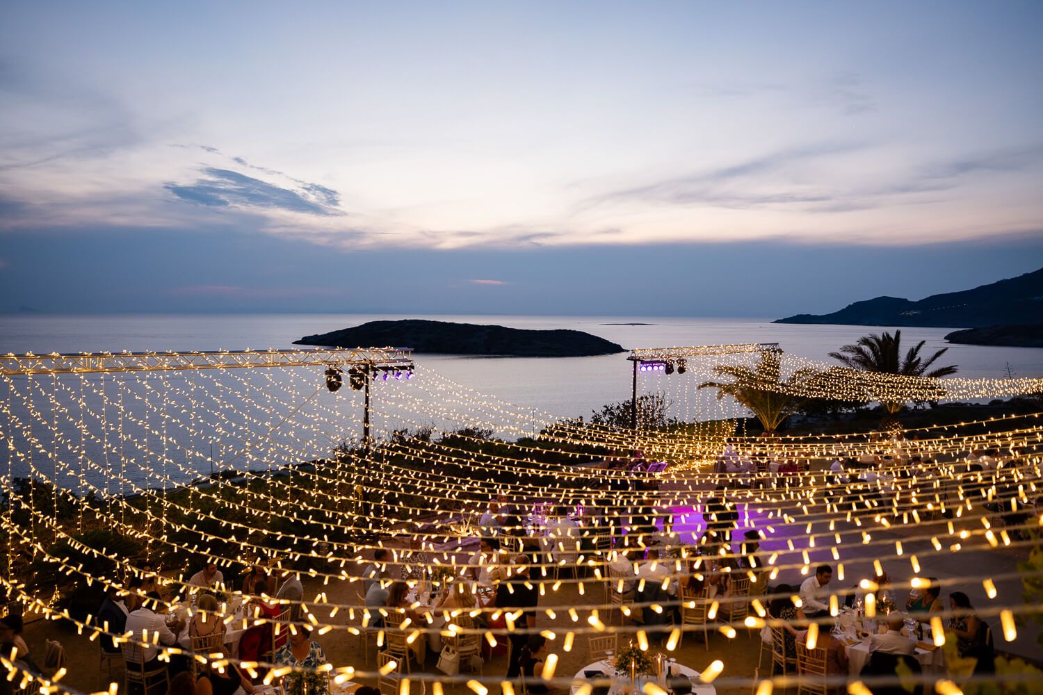 Stunning outdoor wedding reception setup at Villa Komito Syros