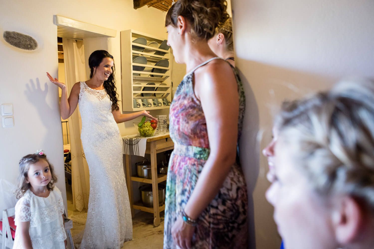 Spanish bride with bridesmaids having fun during preparation