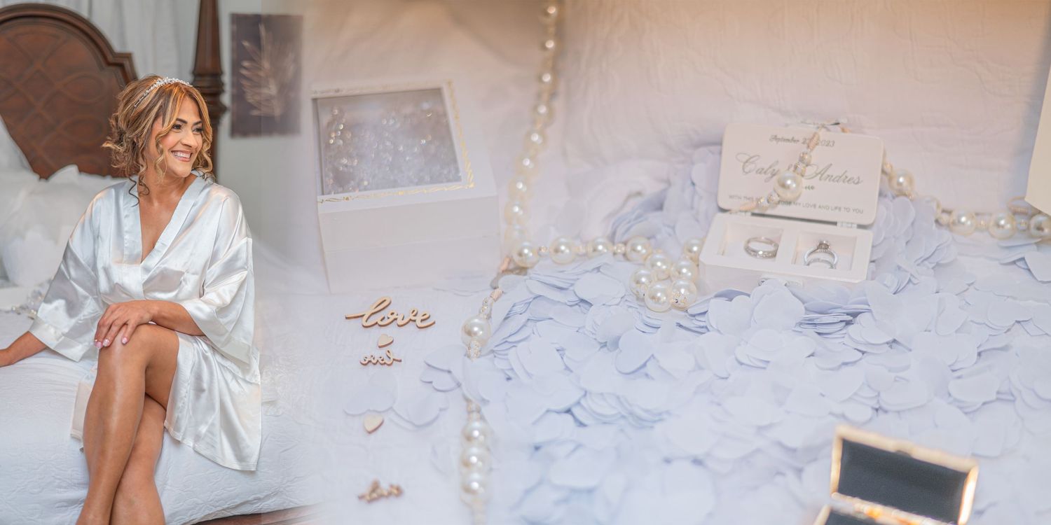 Professional photo editing desk setup with bright lighting and scattered printed photos.