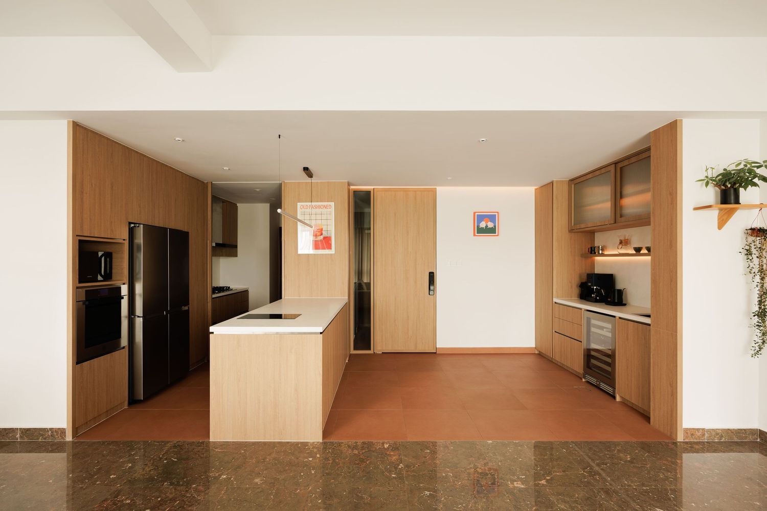 Modern office hallway with wooden paneling, built-in storage, and natural lighting creating a warm minimalist atmosphere.