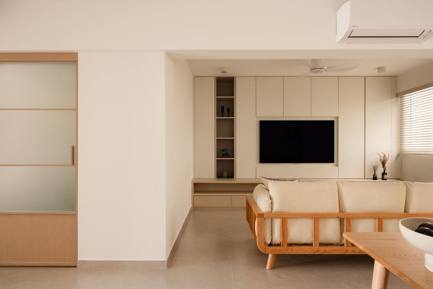 Modern white kitchen interior with minimalist design features sleek cabinetry and natural light.
