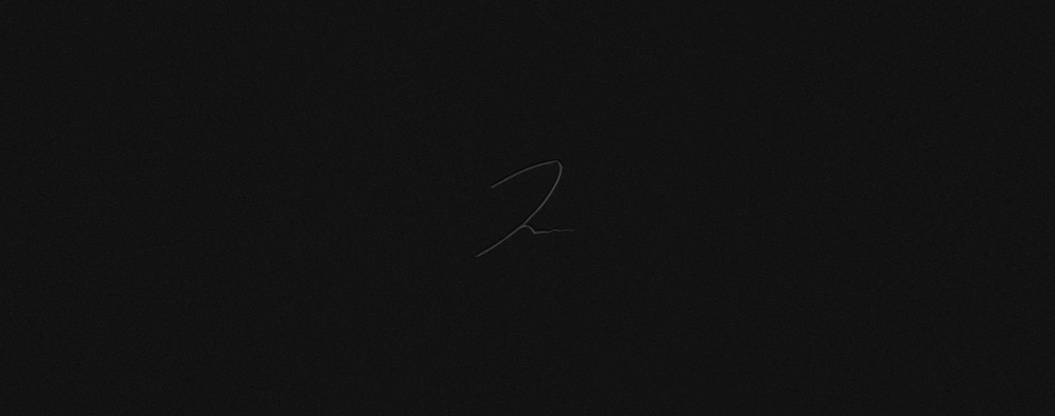 Minimalist cursive signature on dark black background.