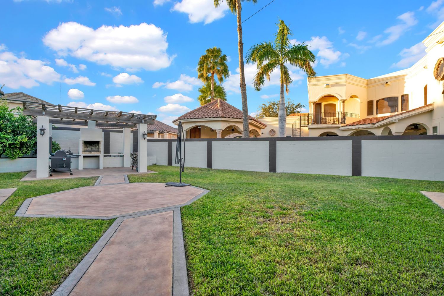 Spacious backyard with patio in Laredo home