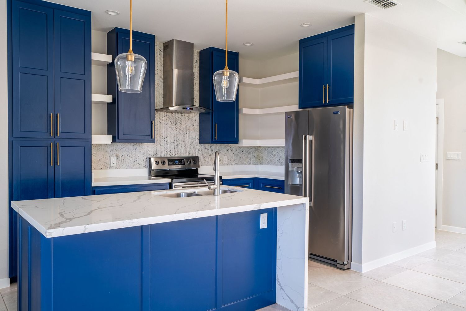 Modern kitchen with island in Laredo, TX home