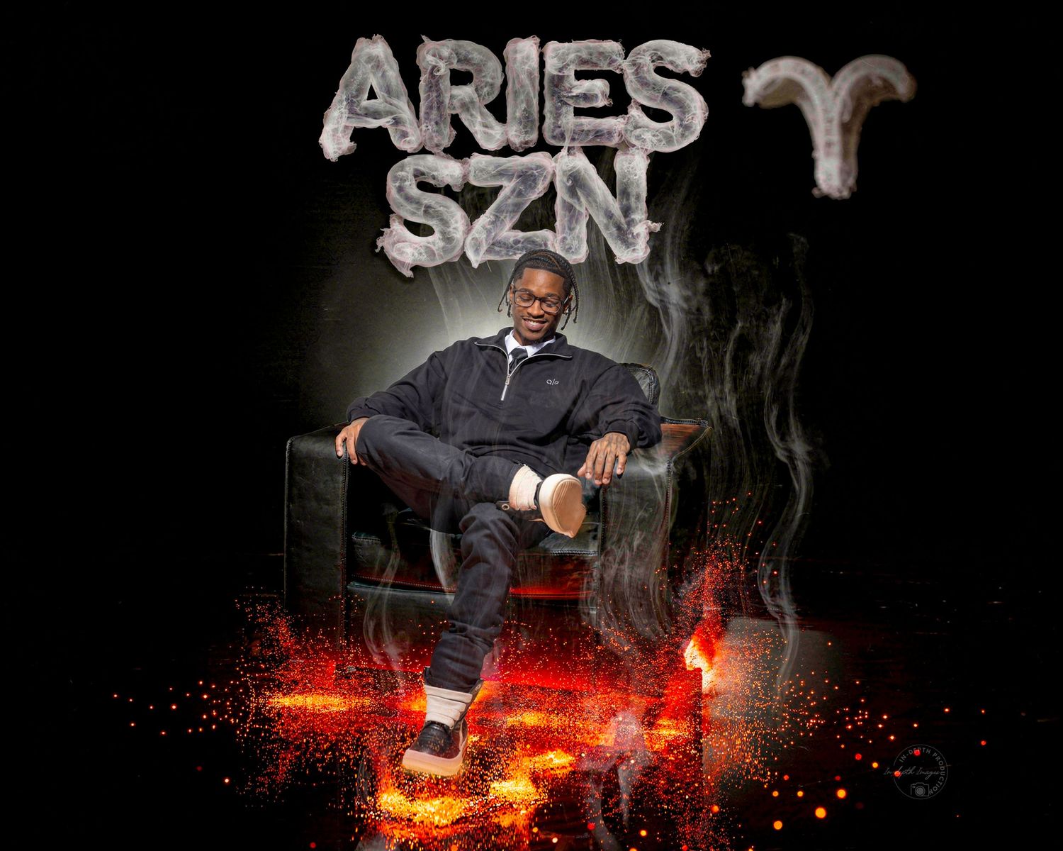 Man posing in Aries SZN themed photo with fire and smoke effects.