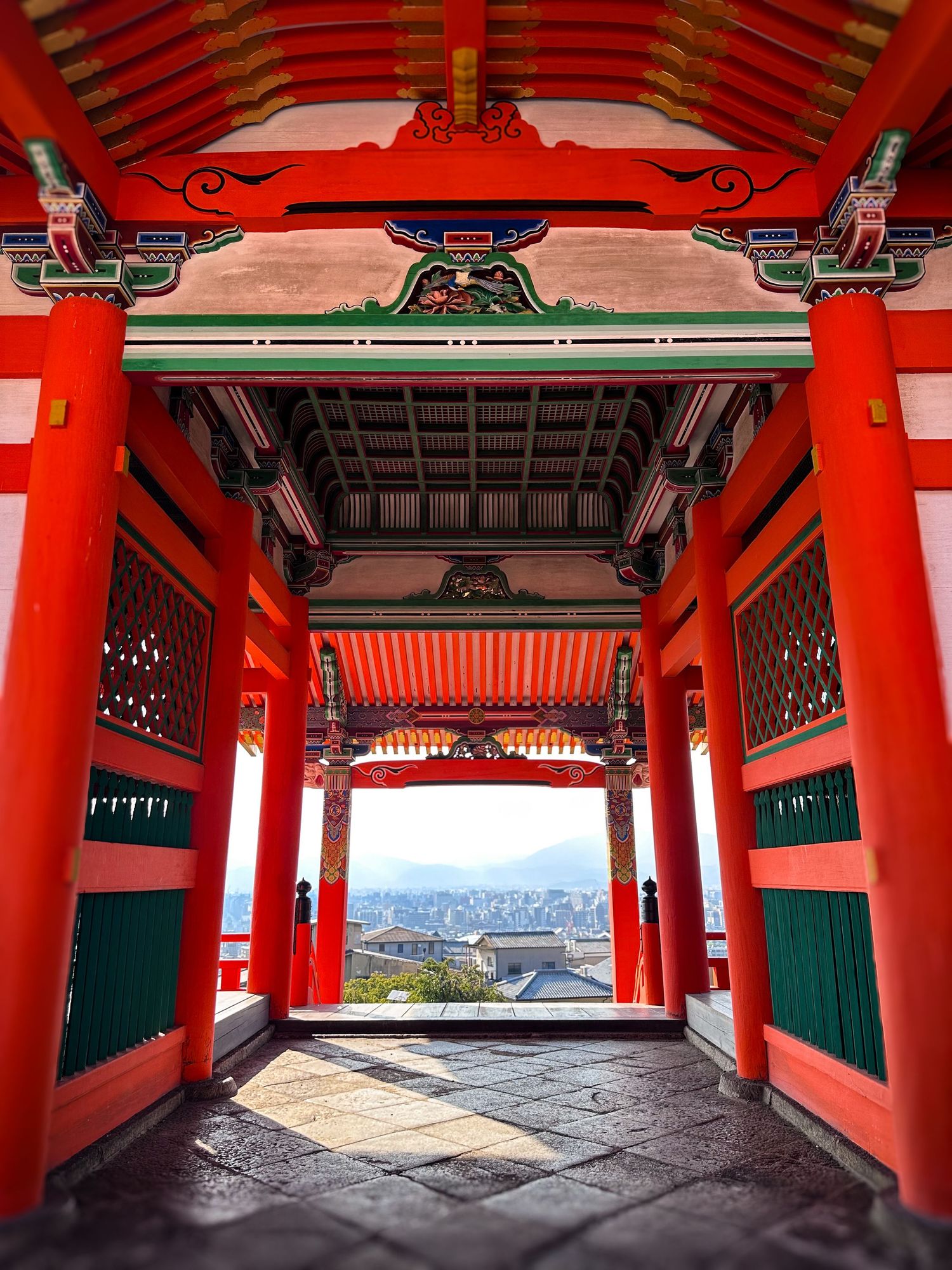 View of Kyoto through the Sai-mon gate at Kiyomizu-dera Temple in Kyoto, Japan
