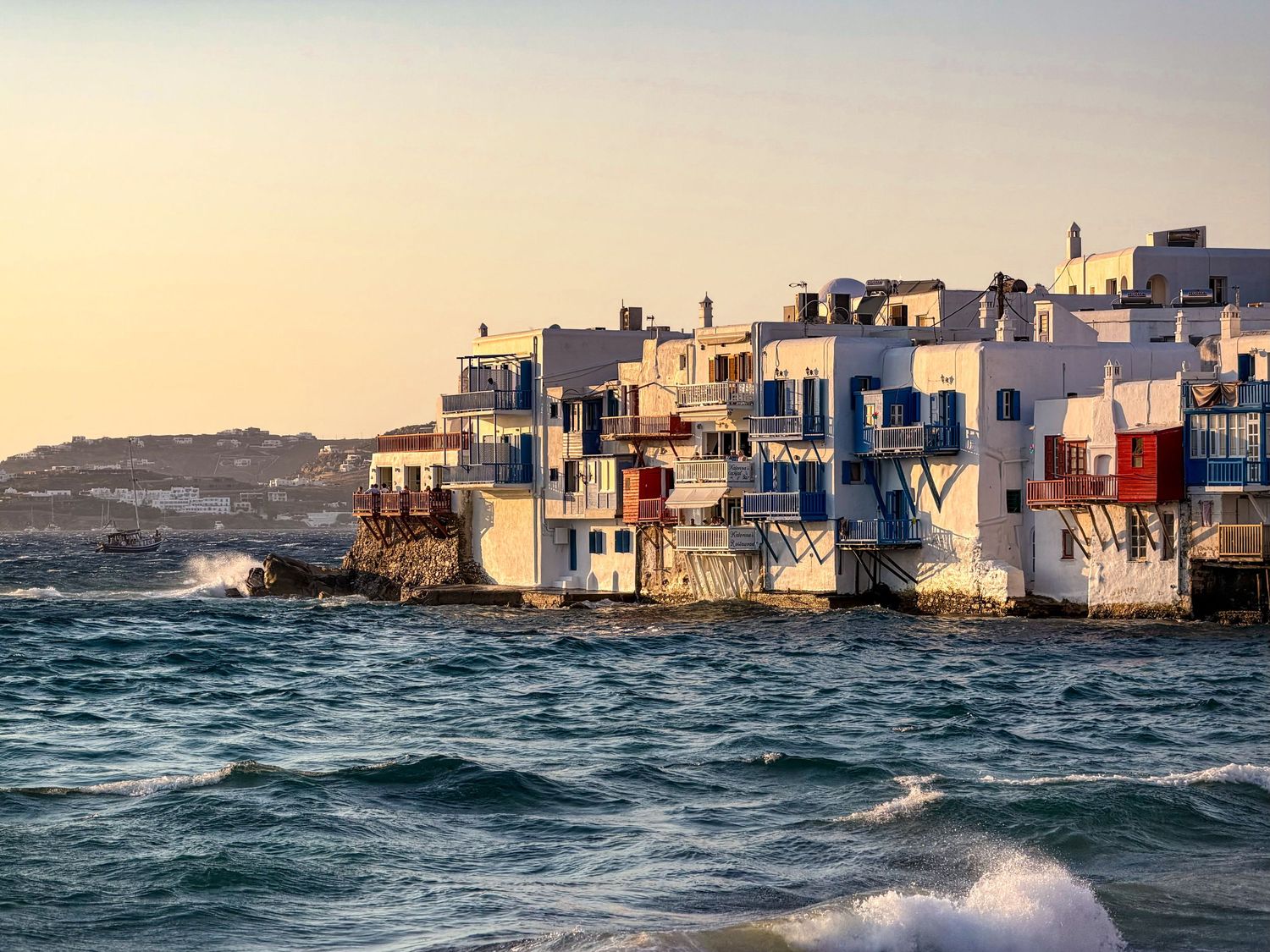 Whitewashed buildings of Little Venice along the Aegean Sea in Mykonos Town, Greece