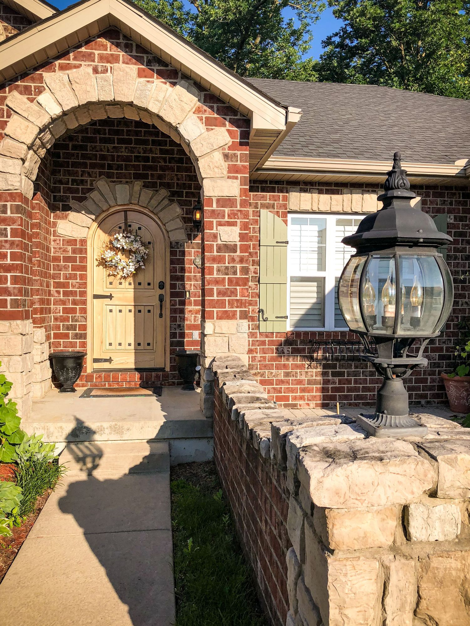 Front Door and lantern of a brick home in St. Louis, Missouri