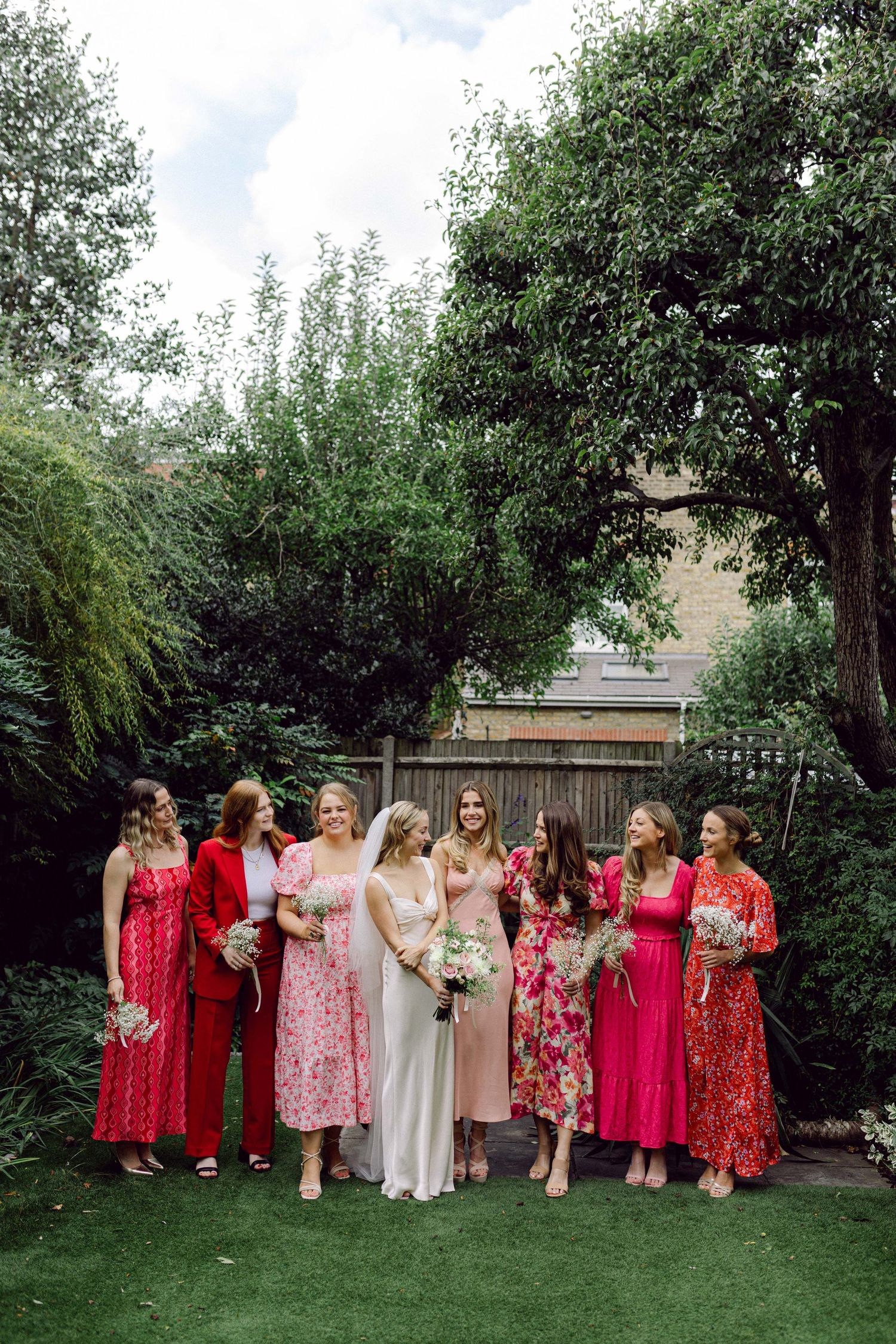 Bride with bridesmaids wearing Barbie pink in London